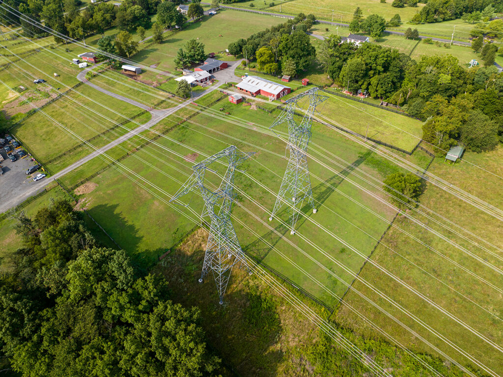 A transmission line spans rural, agricultural land in Loudon County.