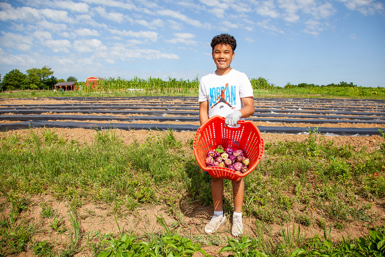 Community farm volunteer Jaiden